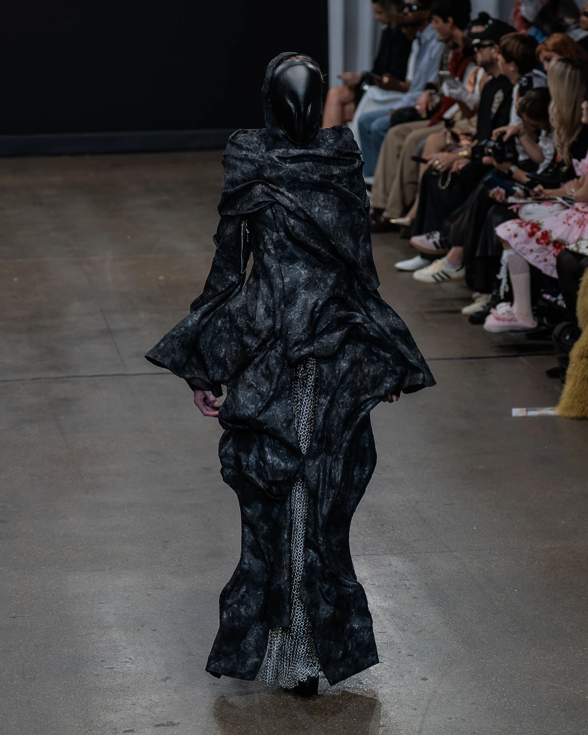 C.PROTOCOL SS27 — dark sculptural draping, garment view